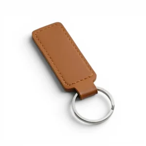 A coffe brown, blank premium leather keyholder before customisation, showcasing the raw stitching and thick leather grain on a wooden workshop table by WIKXY.
