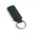 wikxy-laser-engraved-leather-keyholder-rectangular-shape-dark-green A dark green, blank premium leather keyholder before customisation, showcasing the raw stitching and thick leather grain on a wooden workshop table by WIKXY.